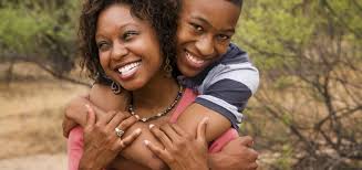 1558410136_African mom and teen.jpeg